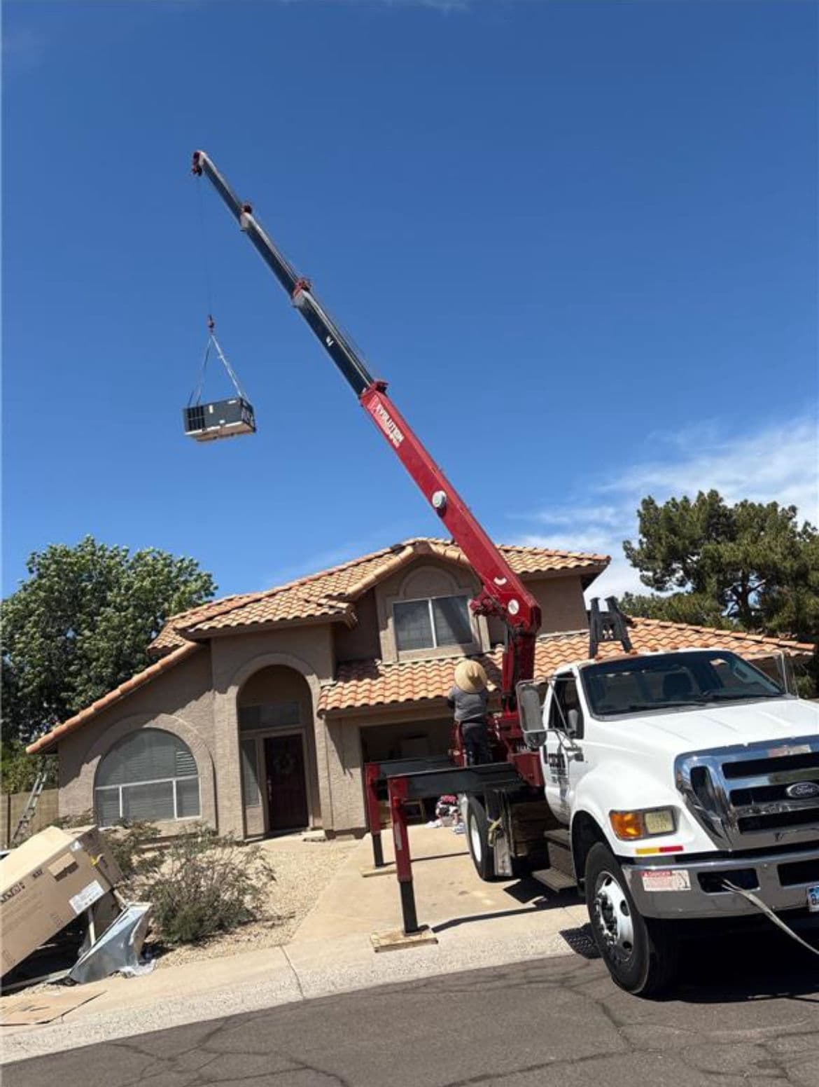 Rooftop HVAC Unit Gets Craned Into Place on This Home image